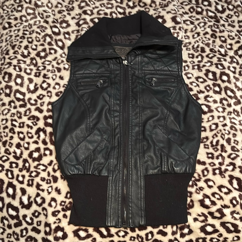 Black Faux Leather Vest 
Zip up 
New with tags